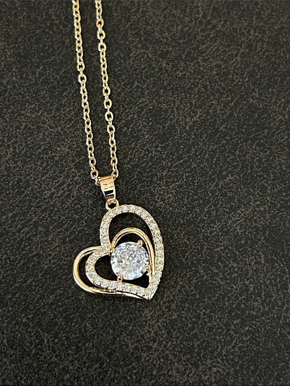 Gold Heart Pendant Necklace with Center Stone